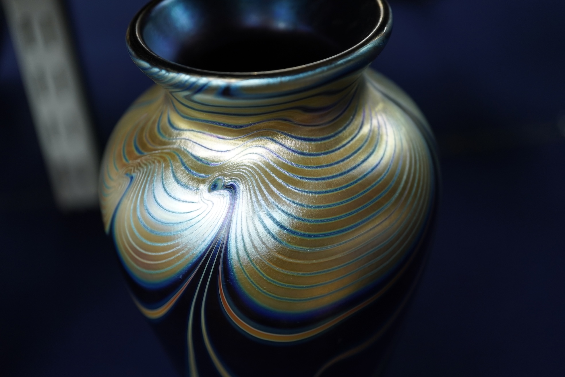 An Isle of Wight iridescent glass vase, Richard Golding Okra Luxor vase and Jack in Pulpit the box vase (3) tallest 38.5cm